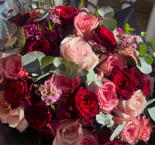 50 Pink & Red Roses Mixed With Luxury Foliage